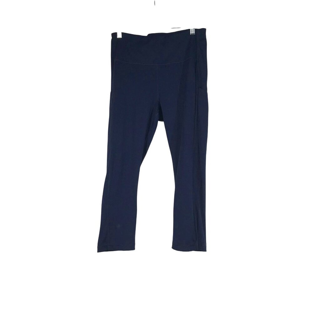 ATHLETA - WOMEN'S MEDIUM - NAVY ULTIMATE STASH POCKET CAPRI PANTS